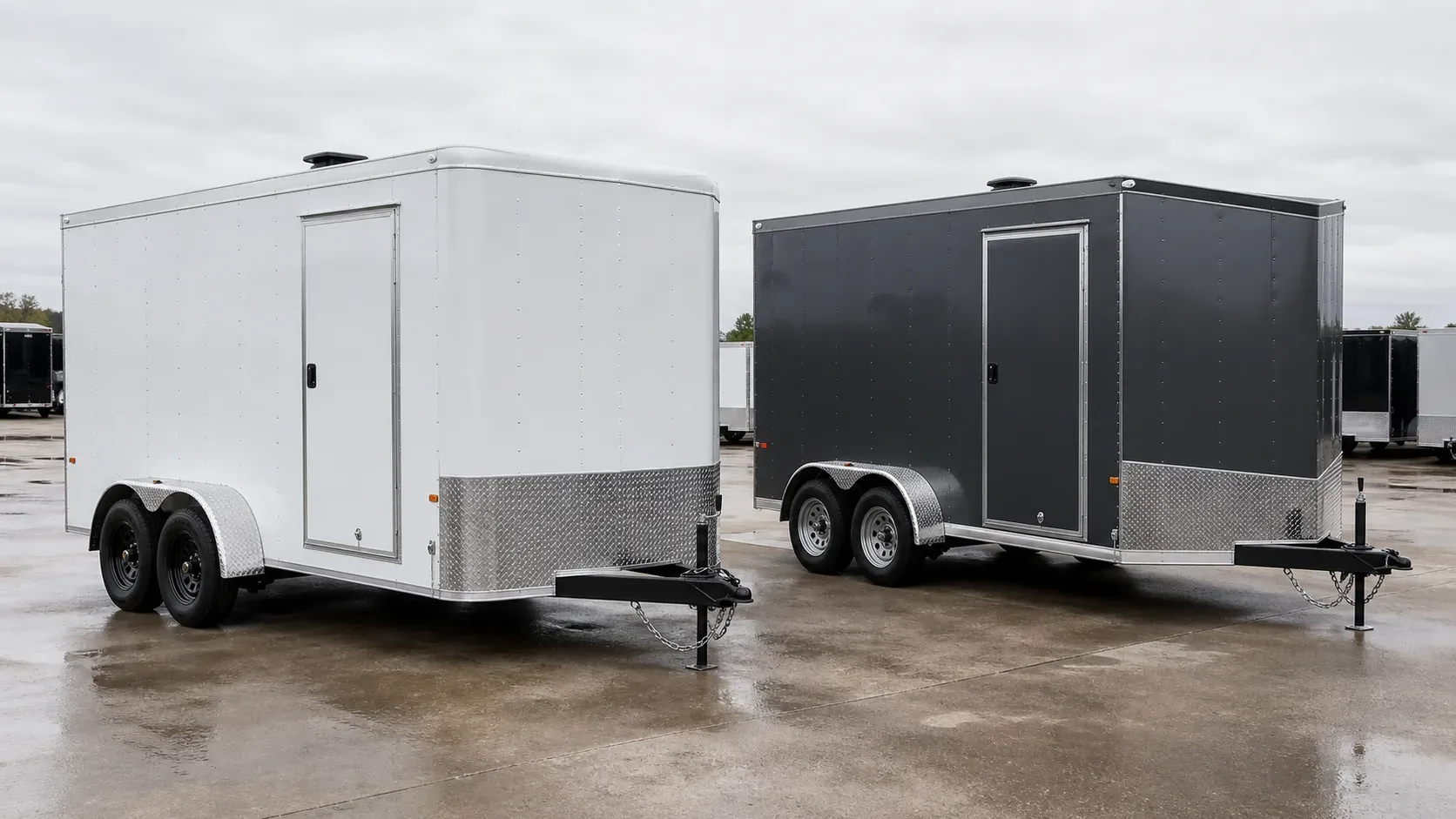 Two matched enclosed cargo trailers with different nose and roof construction shown side by side